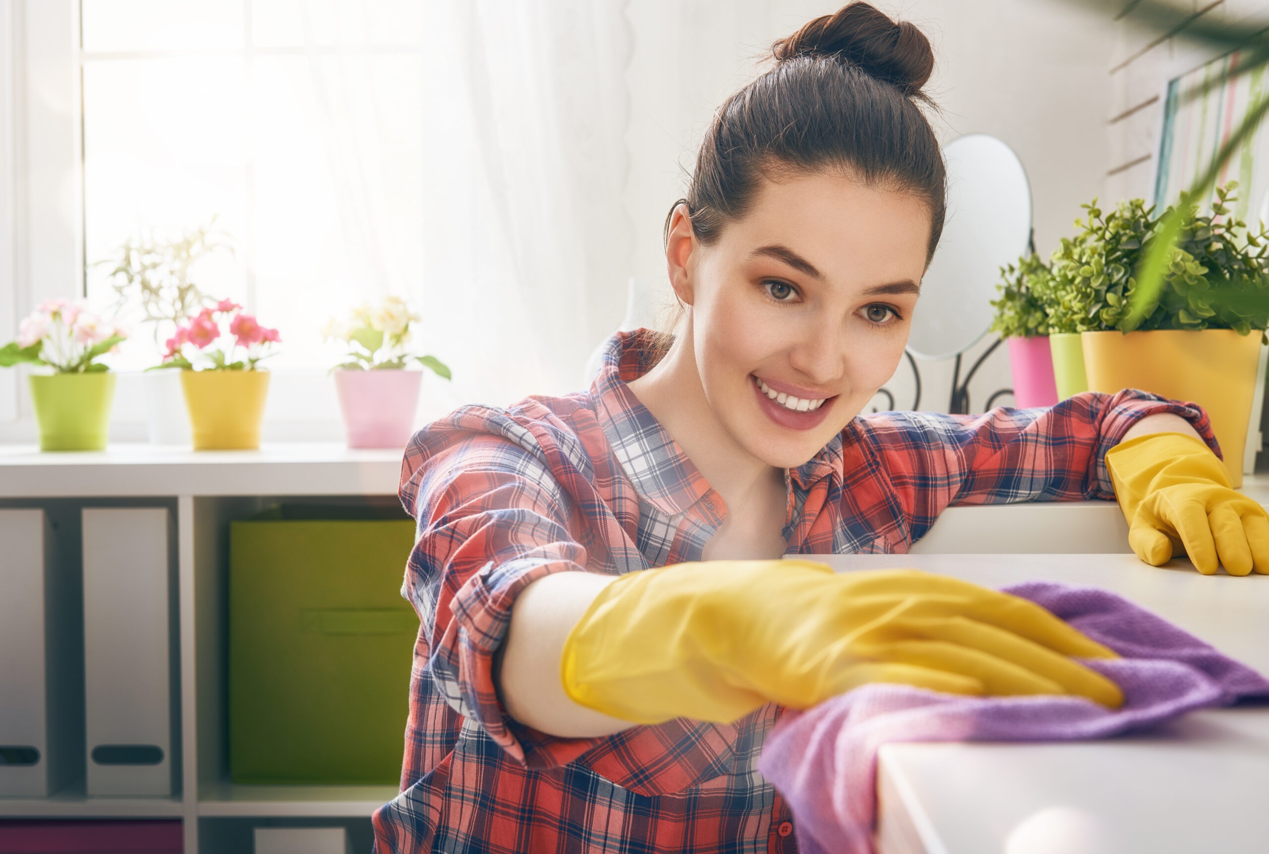 Woman cleaning the table